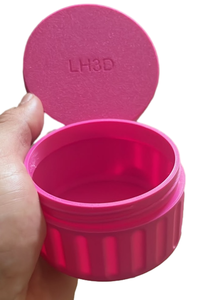 Hand holding the pink airtight jar, open lid view - LH3D organizer kit